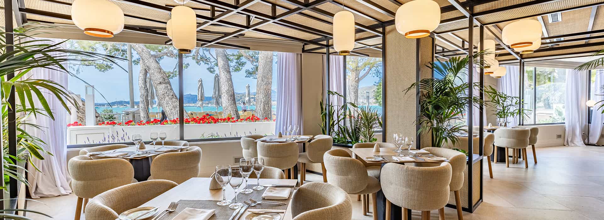 Hotel Illa d'Or | Restaurant The Hotel Illa d'Or’s Restaurant 1929, with large windows offering views of the sea and the Pine Walk